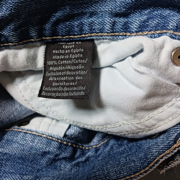 Calvin Klein • Men's Light/Medium Wash Distressed Bootcut Denim Jeans - Picture 9 of 15